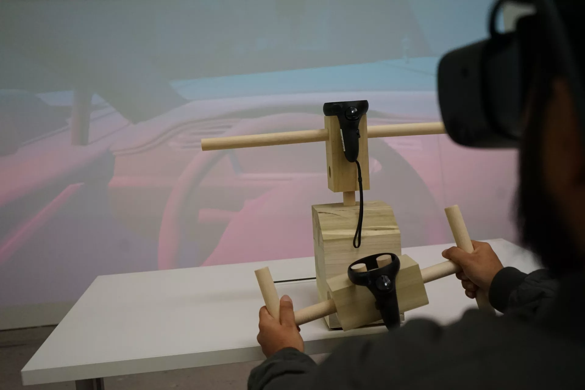 A person interacting with the experience in VR