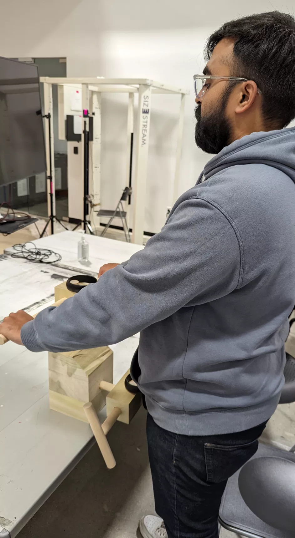 A image showing a person testing the scooter controller for the finalized prototype